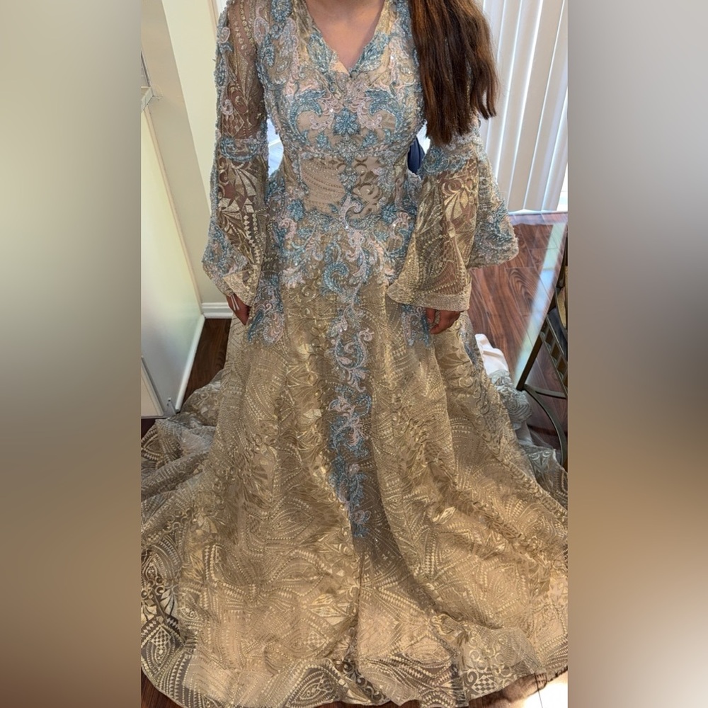 Elegant Gold and Blue Embroidered Gown